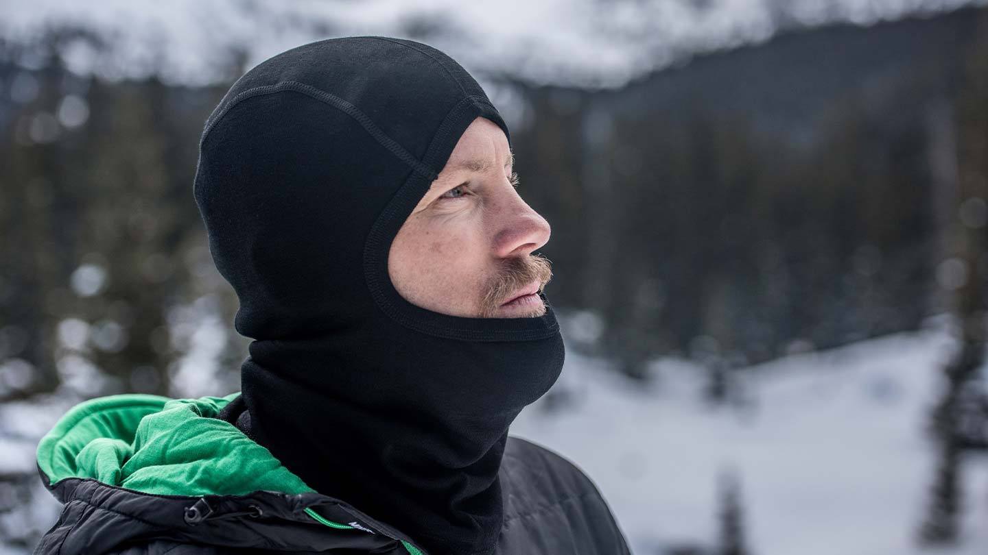 Man wearing Minus33 merino wool balaclava in the snow