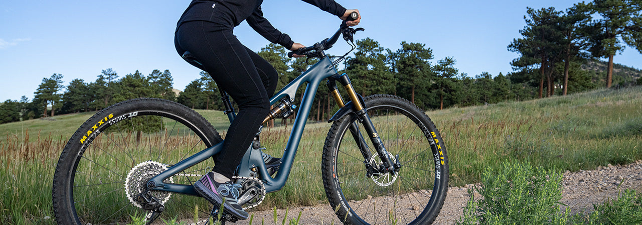 woman biking wearing micro weight woolverino bottoms