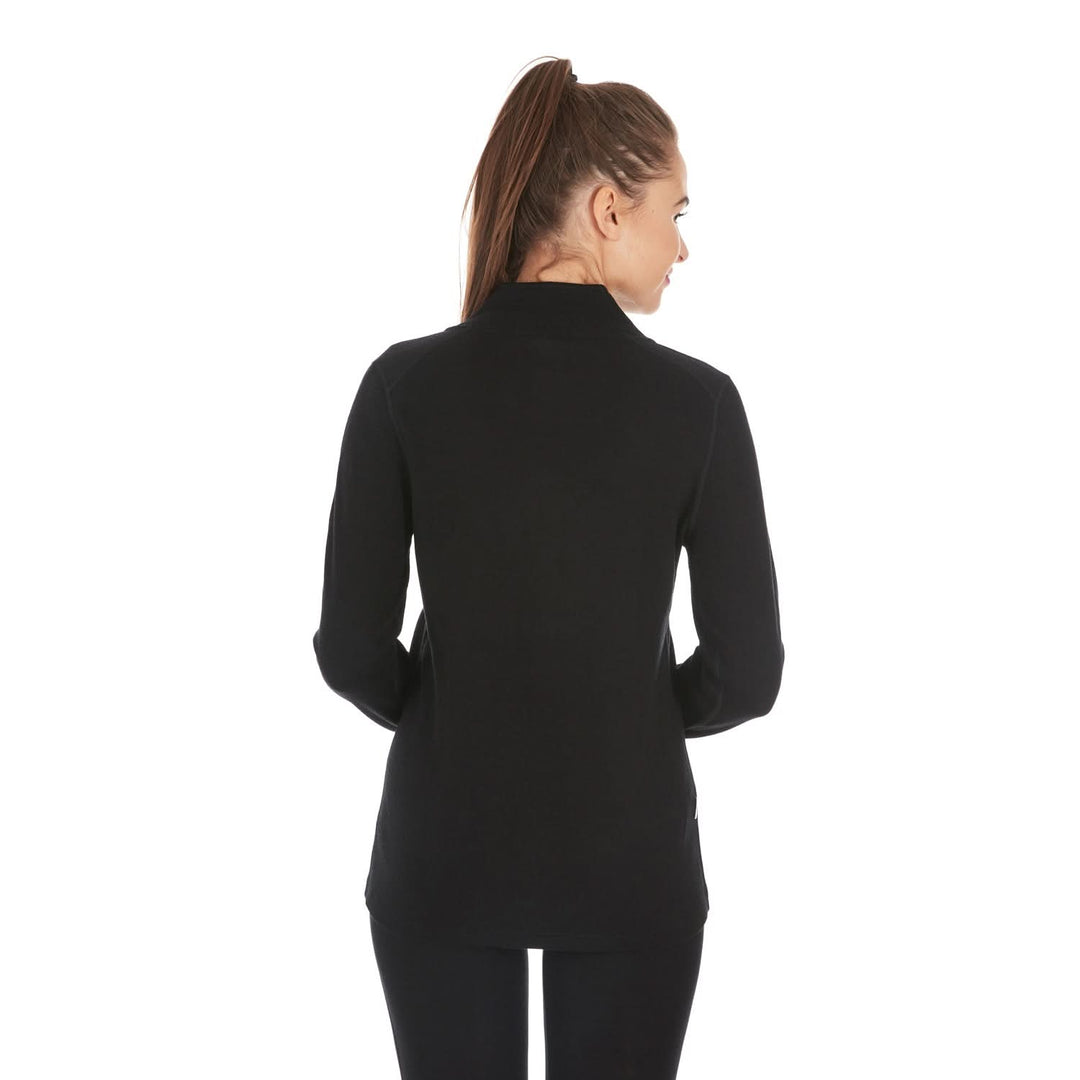 A woman models a hundred percent merino wool heavyweight full zip sweater. This outer layer features a two and a half inch mock neck collar, two zippered pockets, and thumbholes. #color_black