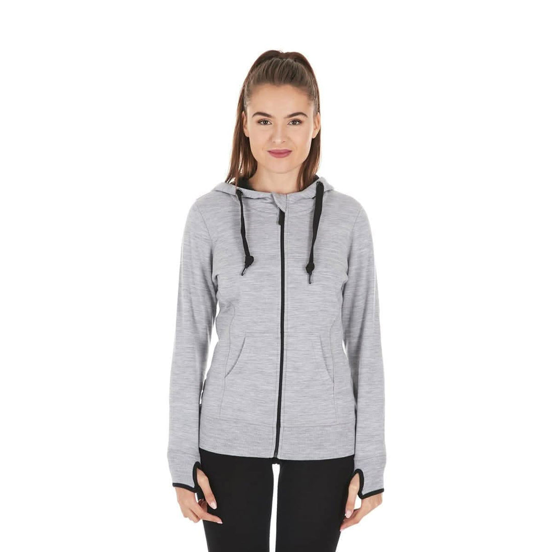 A woman models the heavyweight merino wool brushed fleece hoodie. The hoodie features a large hood with drawstrings, thumbholes, two pockets, and an interior stash pocket inside. #color_ash-gray