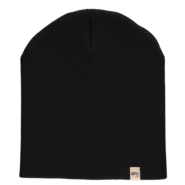 A heavyweight, super soft, one hundred percent merino wool beanie. This heavyweight beanie is the warmest hat that we offer, perfect for hiking through the White Mountains, or sitting at a bonfire in January. #color_black