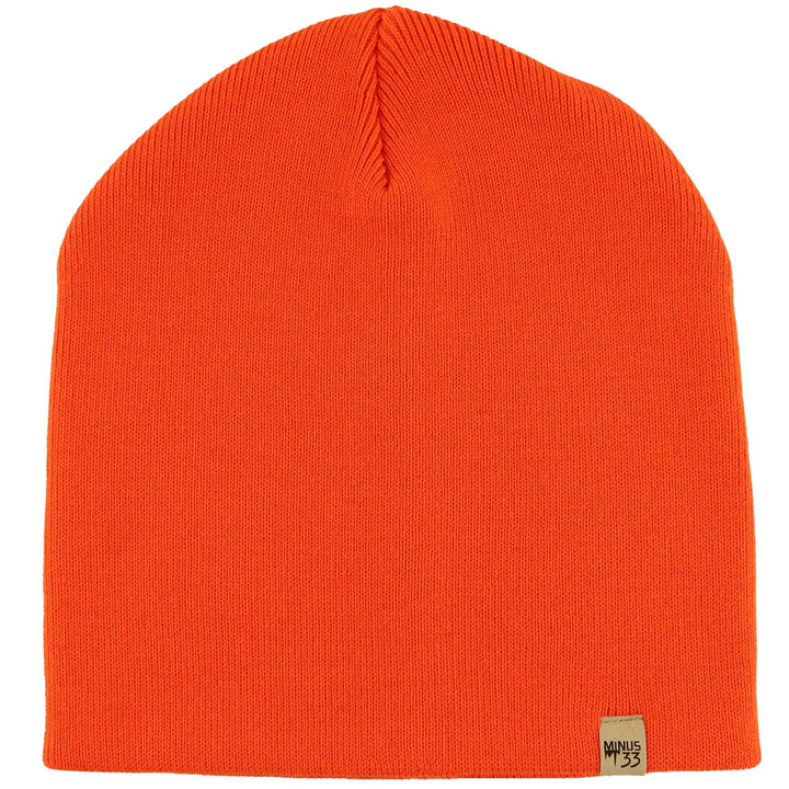 A heavyweight, super soft, one hundred percent merino wool beanie. This heavyweight beanie is the warmest hat that we offer, perfect for hiking through the White Mountains, or sitting at a bonfire in January. #color_blaze-orange