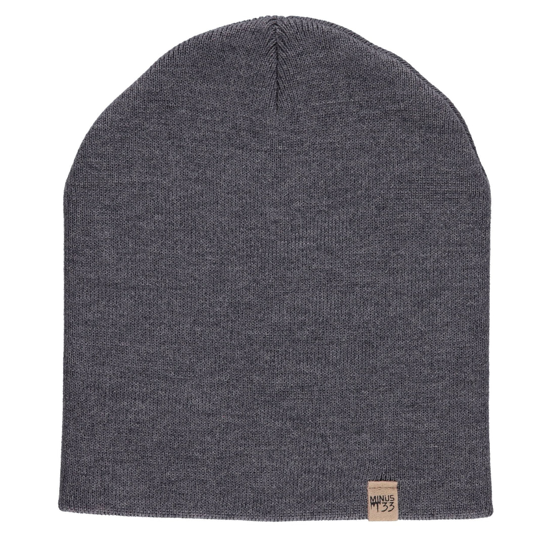A heavyweight, super soft, one hundred percent merino wool beanie. This heavyweight beanie is the warmest hat that we offer, perfect for hiking through the White Mountains, or sitting at a bonfire in January. #color_charcoal-gray
