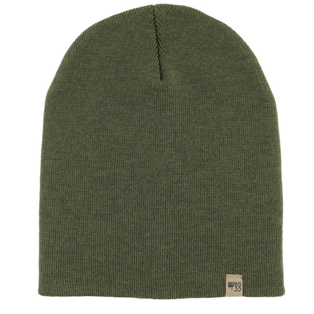 A heavyweight, super soft, one hundred percent merino wool beanie. This heavyweight beanie is the warmest hat that we offer, perfect for hiking through the White Mountains, or sitting at a bonfire in January. #color_olive-drab-green