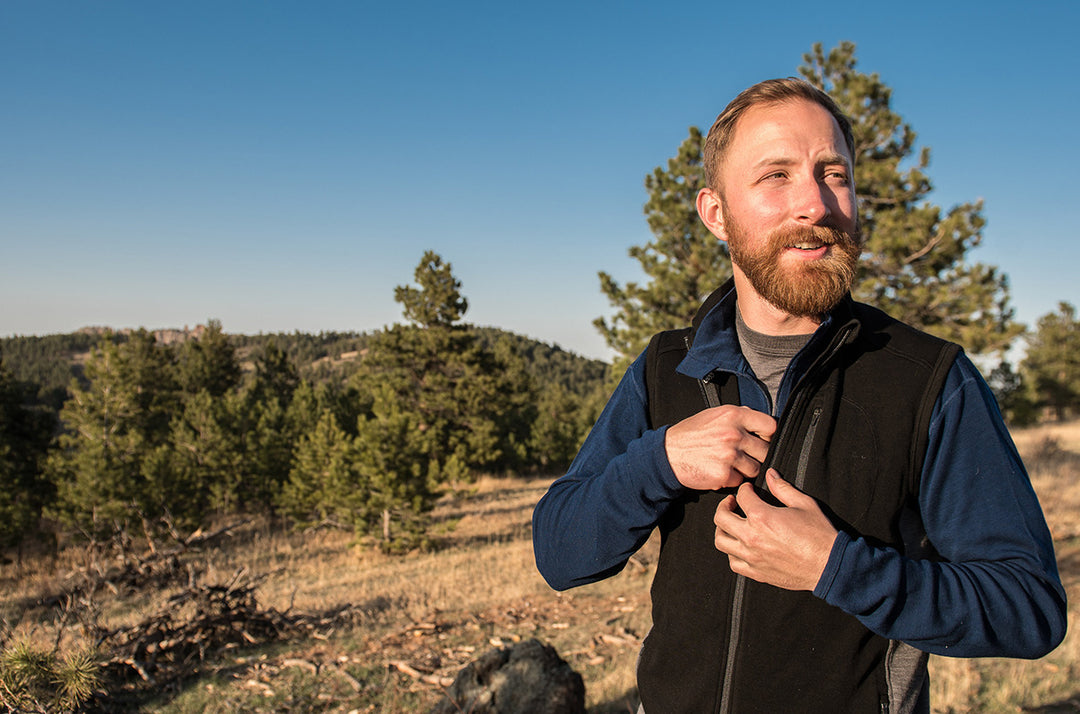 man wearing merino wool vest