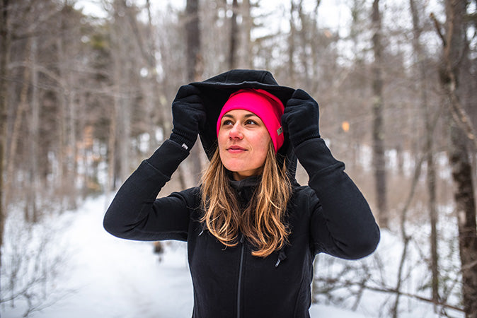 woman hiking wearing kodiak fleece hoodie