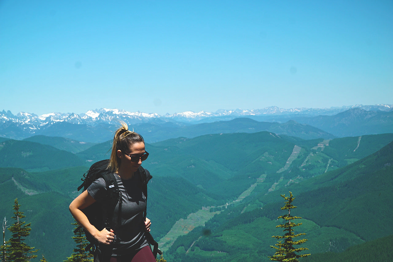 woman hiking wearing 100 percent merino wool lightweight crew tshirt