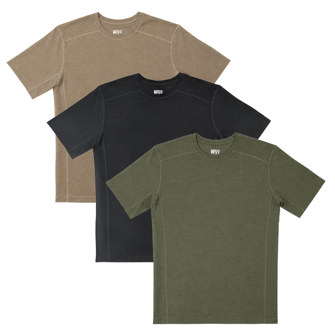 Three merino wool t-shirts in tan 499, black, and green on a white background