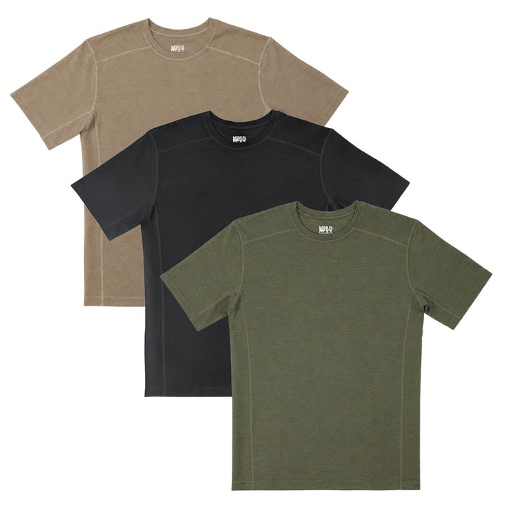 Three merino wool t-shirts in tan 499, black, and green on a white background