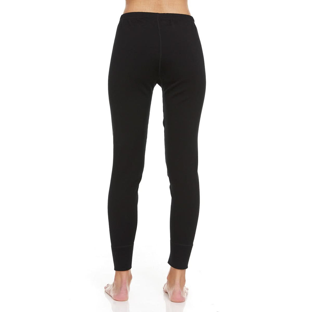 A pair of one hundred percent merino wool heavyweight women's base layer bottoms. These bottoms feature a gusset between the legs for improved range of motion, and cuffs around the ankles for comfort and style. #color_black