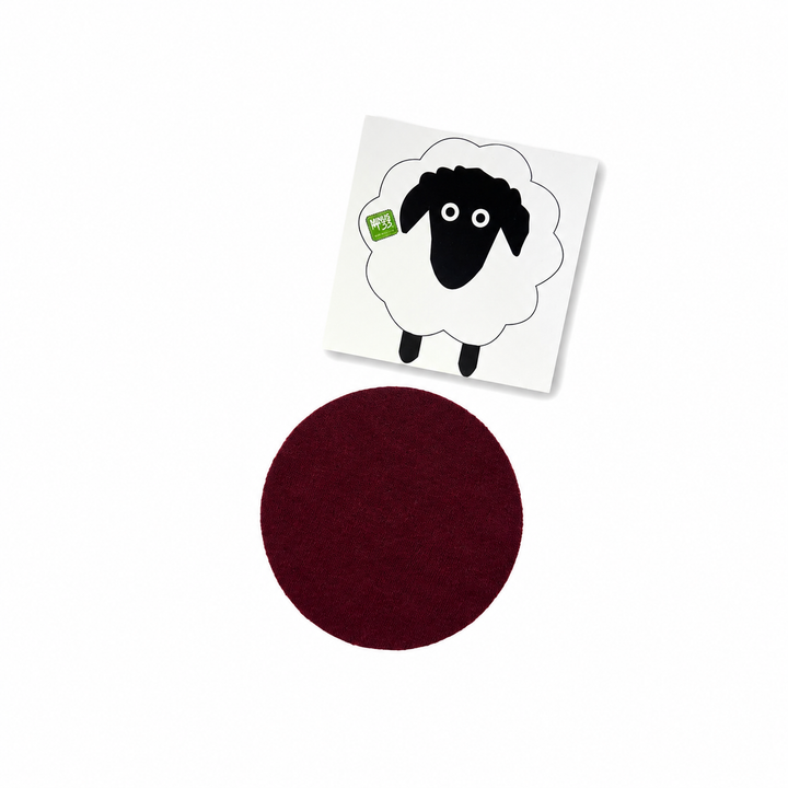 Merino wool clothing patch repair kit, set of repair patches shown flat on a white background 